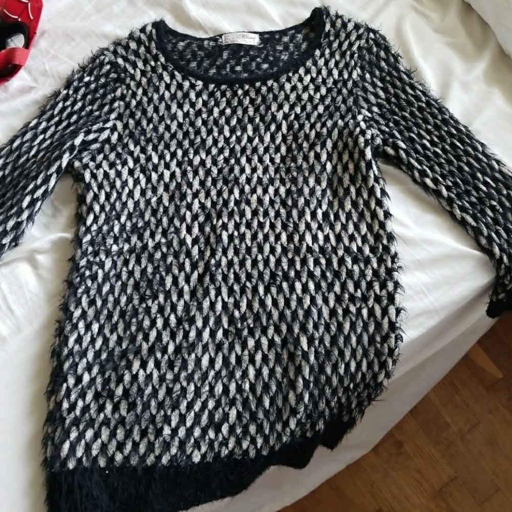 Black and white fuzzy soft sweater.